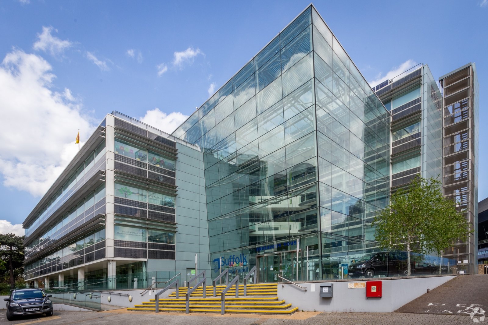 Modern glass-fronted Suffolk County Council offices at Endeavour House in Ipswich, representing local government and public service decision-making in Suffolk.