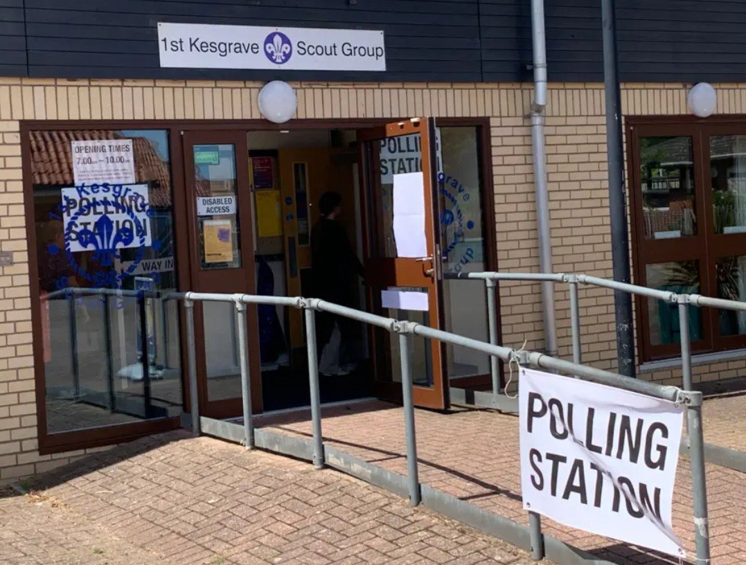 Entrance to the 1st Kesgrave Scout Group building with 'Polling Station' signage and a disabled access ramp.